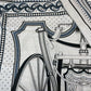 Hermès エルメス Châle 140 Les Roues de Phaéton  カレジュアン140(四輪馬車の車輪) カシミア70%、シルク30% gris chiné(グリシネ) / ardoise clair(アルドワーズクレール) / Black(ブラック)