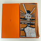Hermès エルメス Châle 140 Les Roues de Phaéton  カレジュアン140(四輪馬車の車輪) カシミア70%、シルク30% キャラメル/グリシネ/ブラック Caramel/Gris chine/Black