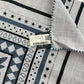 Hermès エルメス Châle 140 Les Roues de Phaéton  カレジュアン140(四輪馬車の車輪) カシミア70%、シルク30% gris chiné(グリシネ) / ardoise clair(アルドワーズクレール) / Black(ブラック)